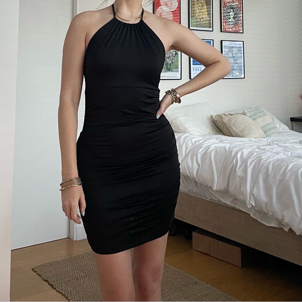 black halter dress with low-back